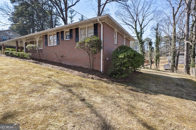 view of property exterior featuring a yard