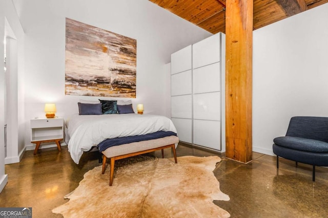 170 Boulevard Se H416, Atlanta, GA 30312 - bedroom with finished concrete flooring and wood ceiling