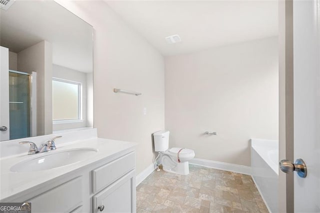 full bathroom with vanity, separate shower and tub, and toilet