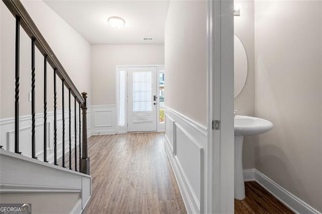 entrance foyer with hardwood / wood-style flooring