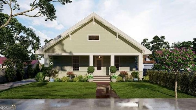 view of front of house with covered porch and a front yard