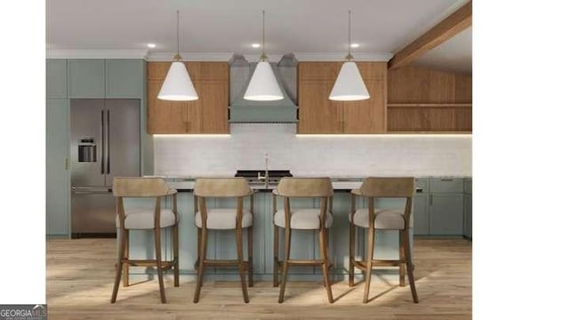 kitchen with premium range hood, light wood-style flooring, a kitchen island with sink, stainless steel refrigerator with ice dispenser, and tasteful backsplash