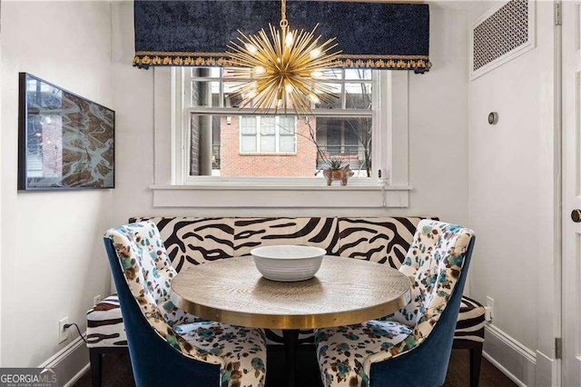 dining room with an inviting chandelier