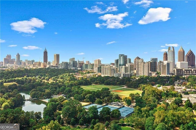 property's view of city with a water view