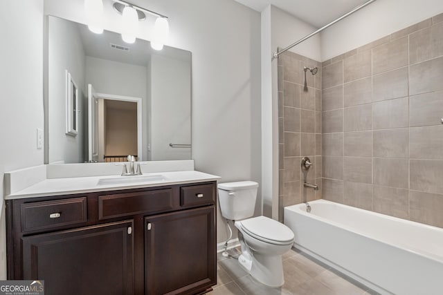 bathroom with tile patterned floors, vanity,  shower combination, toilet, and visible vents