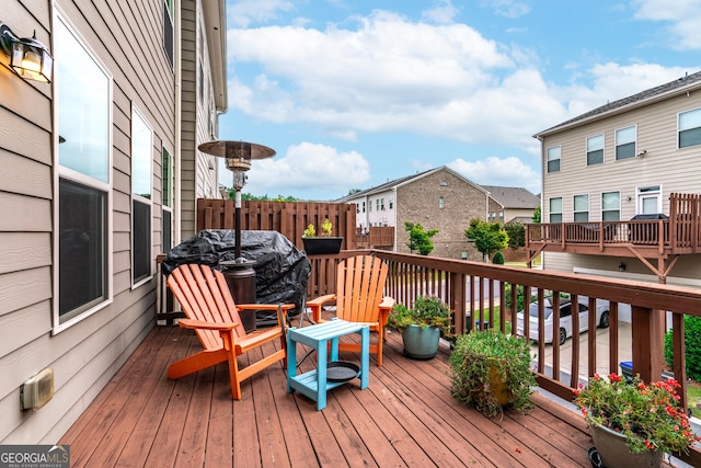 wooden terrace with grilling area