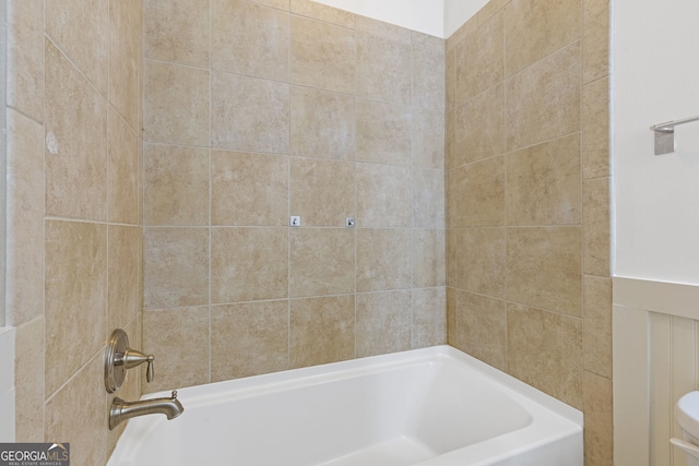 full bath featuring shower / tub combination