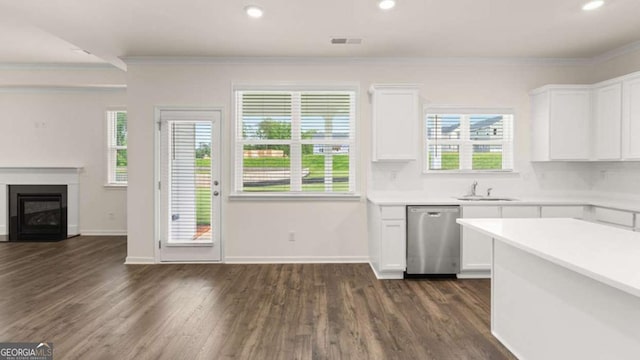 kitchen featuring white cabinetry, dishwasher, dark wood-type flooring, and crown molding