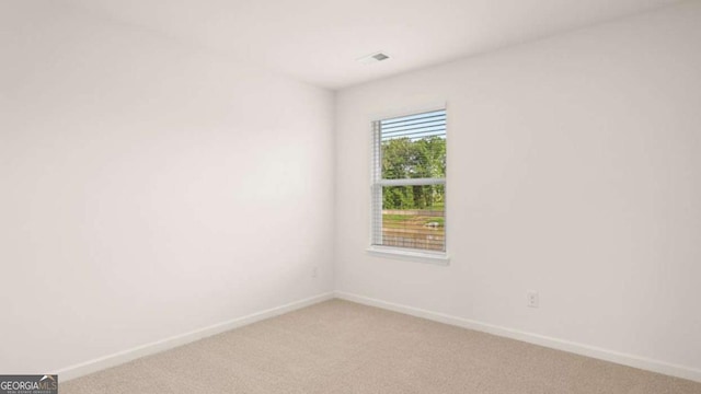 view of carpeted spare room