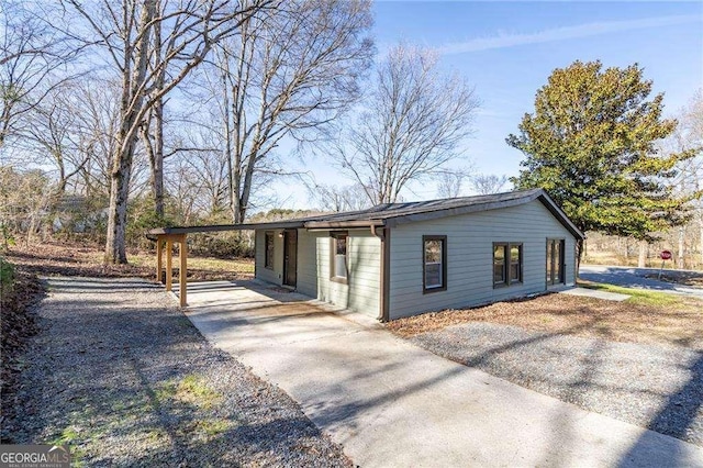 view of front of property with a carport