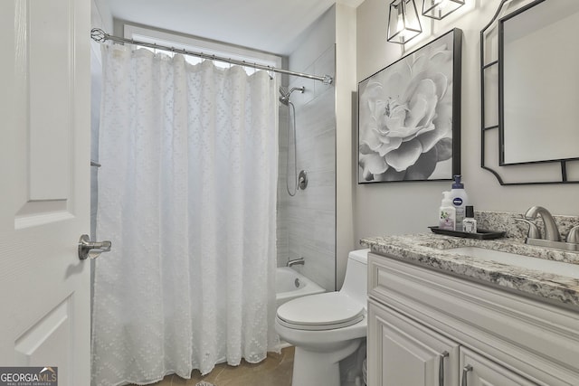 full bathroom featuring vanity, toilet, and shower / bath combo with shower curtain