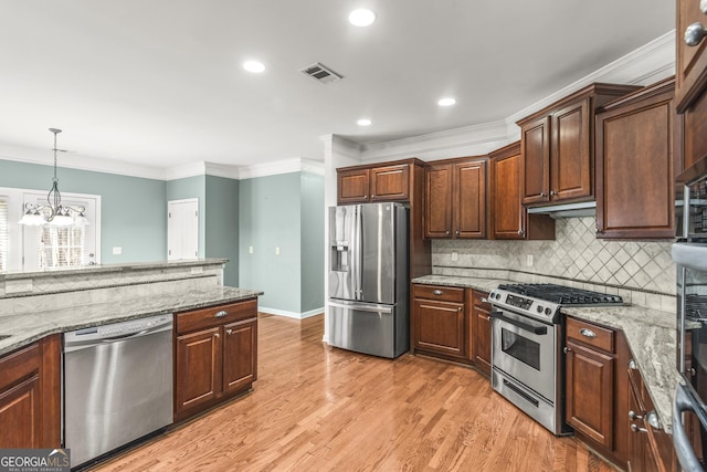 kitchen with tasteful backsplash, visible vents, ornamental molding, stainless steel appliances, and light wood-type flooring