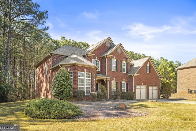 100 Windmeadow Way, Fayetteville, GA 30214 - view of front of house with driveway, brick siding, a front lawn, and a shingled roof