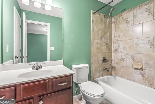 bathroom featuring visible vents,  shower combination, vanity, and toilet