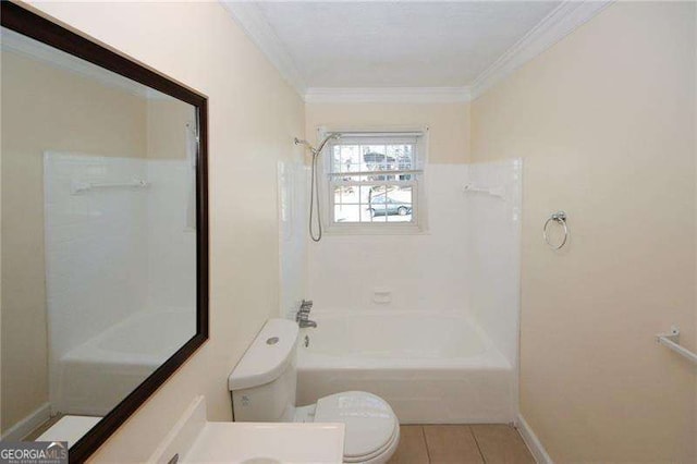 bathroom with tile patterned flooring, crown molding,  shower combination, and toilet