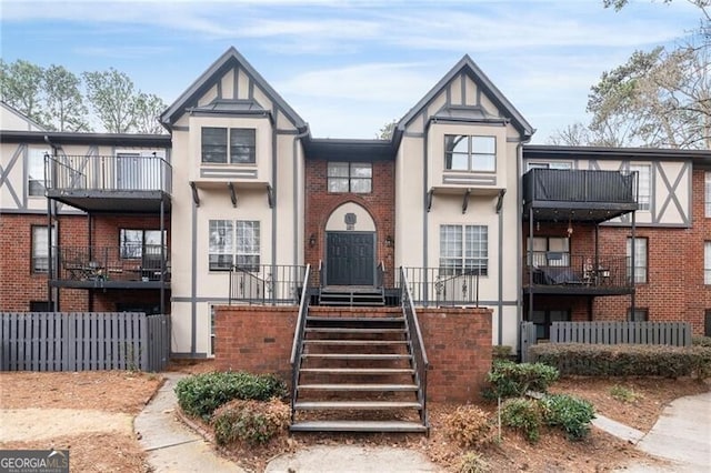 view of front of property with a balcony