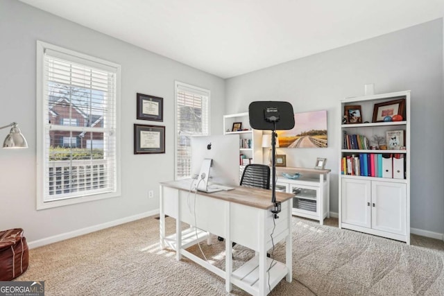 carpeted office space featuring french doors