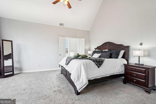 bedroom featuring ceiling fan, light colored carpet, and high vaulted ceiling