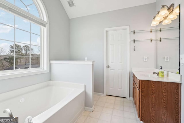 bathroom with vanity, an enclosed shower, and vaulted ceiling