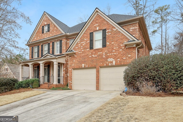 view of front facade with a garage and a porch