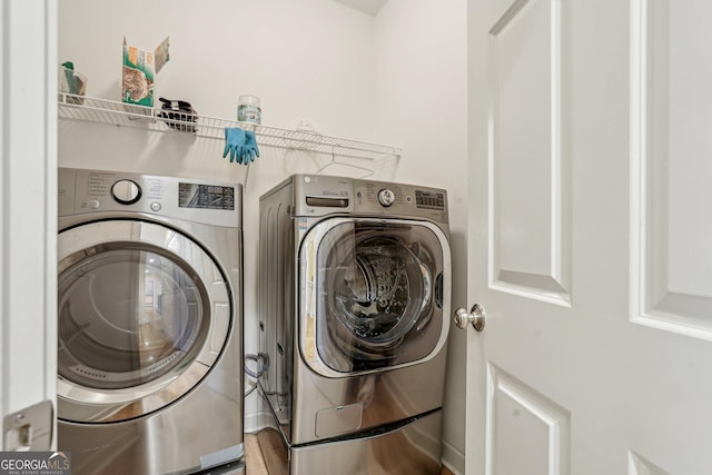 laundry room featuring separate washer and dryer