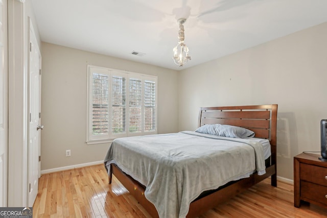 bedroom with light wood-type flooring