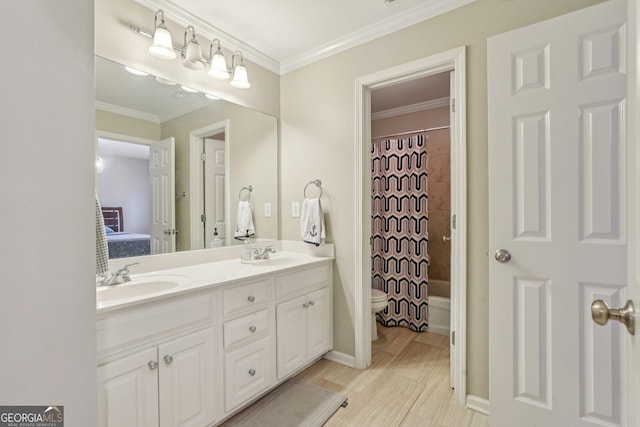 full bathroom featuring hardwood / wood-style floors, vanity, toilet, crown molding, and shower / bath combo with shower curtain