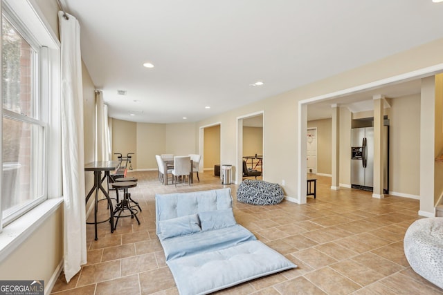 sitting room featuring light tile patterned floors