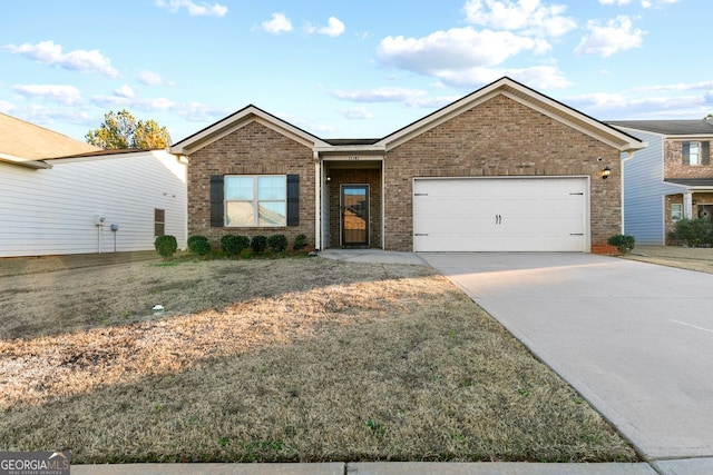 ranch-style home featuring a garage and a front yard