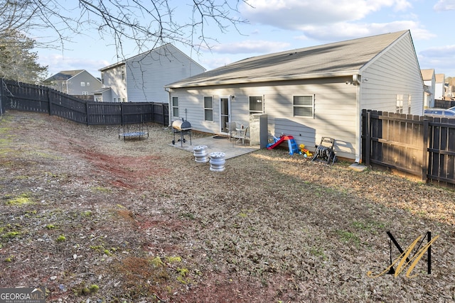 rear view of house featuring a patio