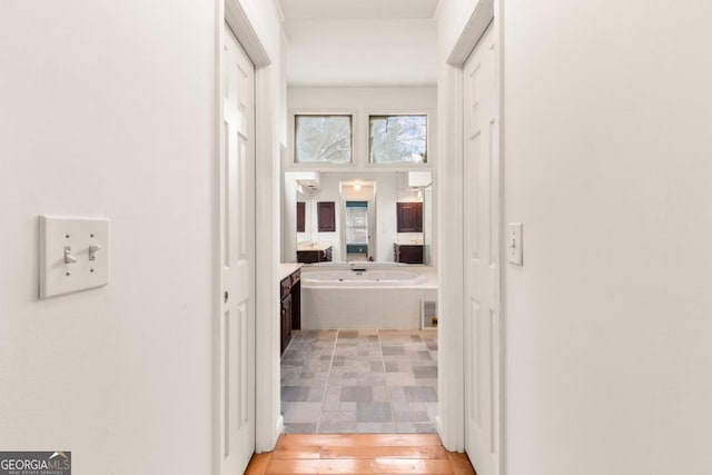 hallway featuring light wood-style floors