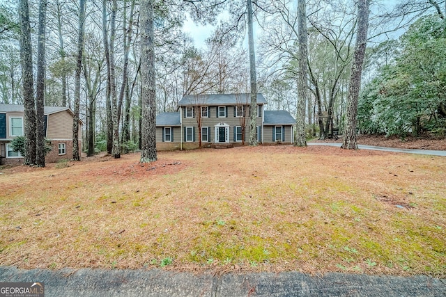 view of front of house with a front lawn