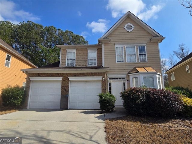 front facade with a garage