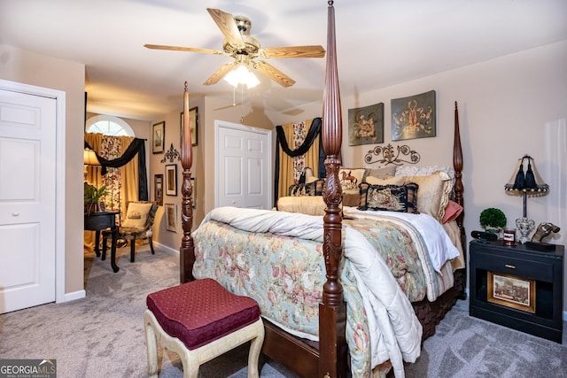 carpeted bedroom featuring ceiling fan