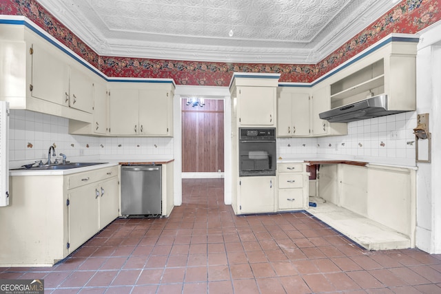kitchen with oven, stainless steel dishwasher, a sink, backsplash, and under cabinet range hood