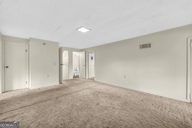 490 College St, Royston, GA 30662 - carpeted empty room with baseboards