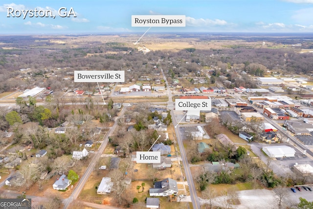 aerial view of property's location with nearby suburban area
