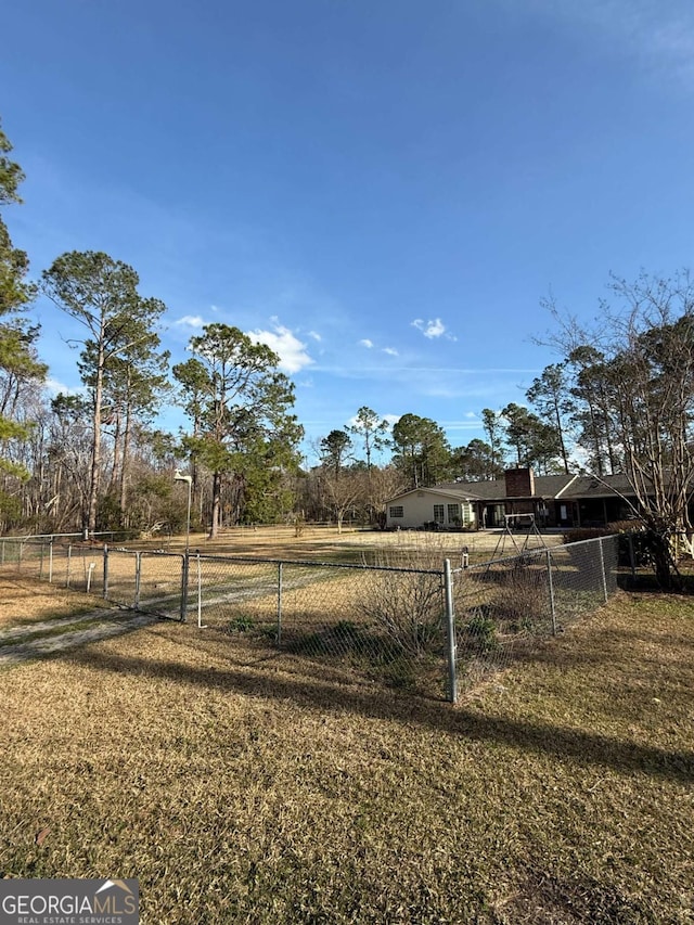 view of yard with fence