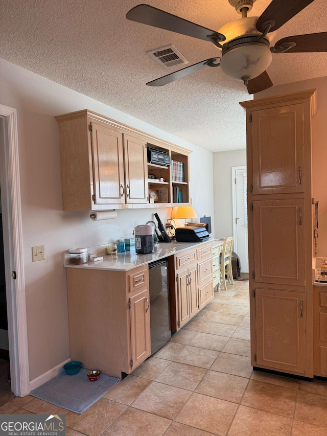 kitchen with light countertops, visible vents, ceiling fan, a textured ceiling, and dishwasher