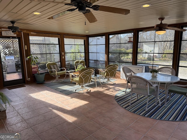 5686 Golden Isle W, Baxley, GA 31513 - unfurnished sunroom with wood ceiling and a ceiling fan