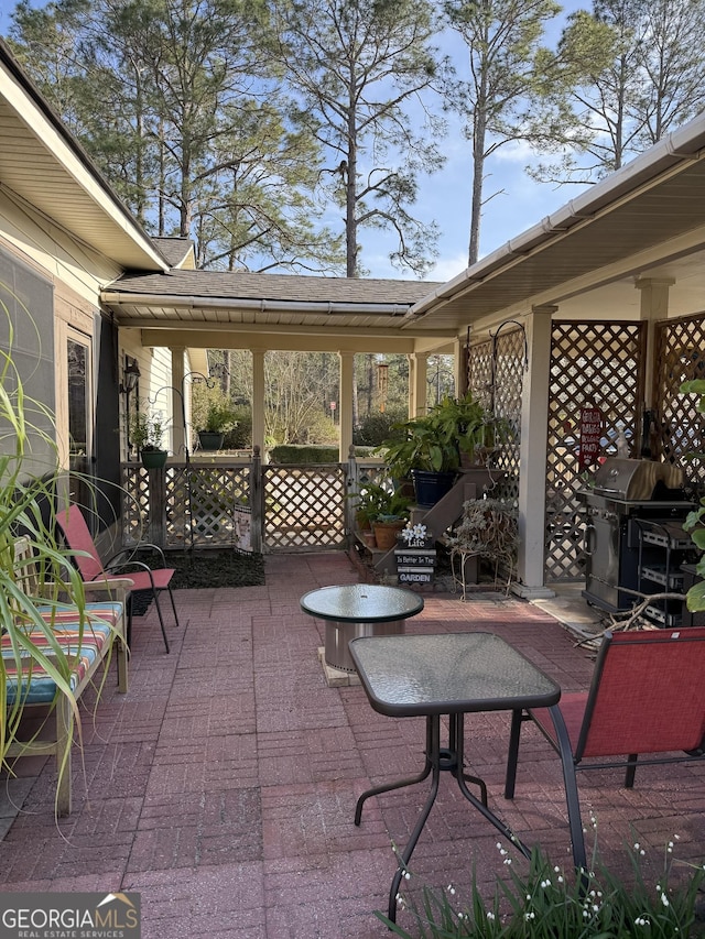 5686 Golden Isle W, Baxley, GA 31513 - view of patio / terrace featuring a grill