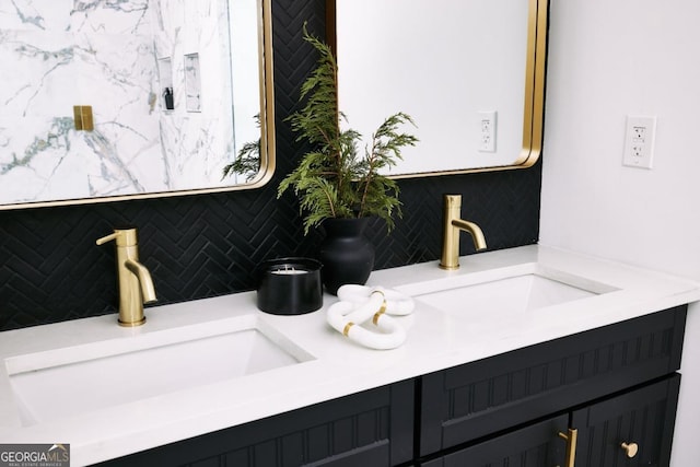 bathroom featuring vanity and tasteful backsplash