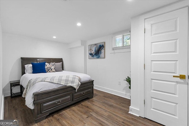 bedroom featuring dark hardwood / wood-style floors