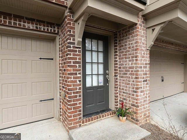 property entrance featuring a garage