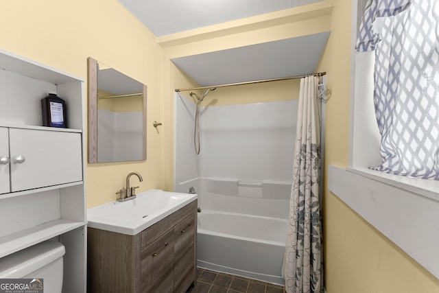 full bathroom featuring vanity, toilet, tile patterned flooring, and shower / bath combo