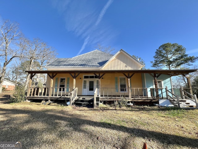 150 Thornton St, Bronwood, GA 39826 - farmhouse inspired home featuring a porch and a front lawn