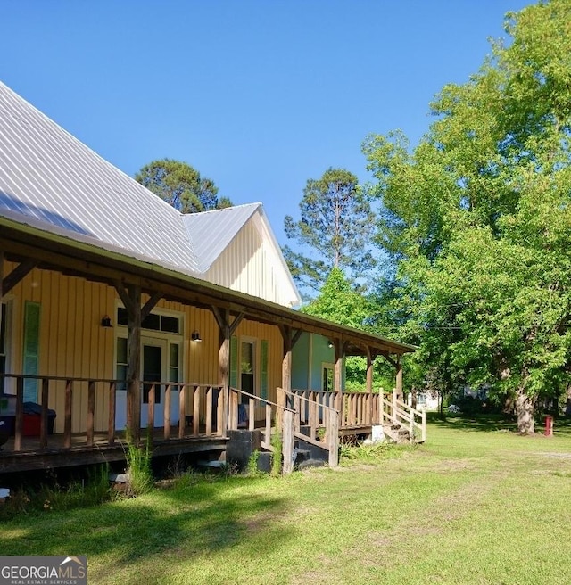 view of home's exterior featuring a yard