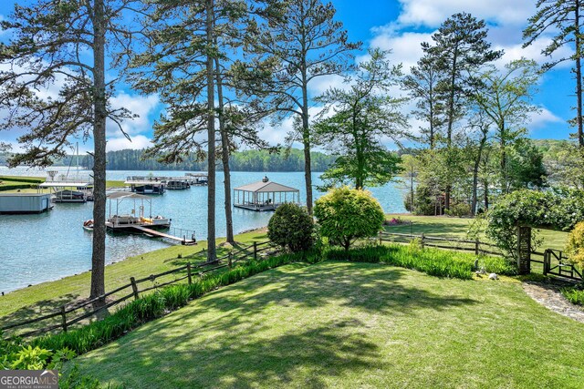 6780 Lawson Cir, Gainesville, GA 30506 - view of yard featuring fence, a floating dock, and a water view