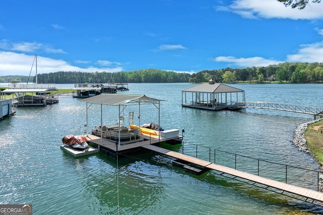 6780 Lawson Cir, Gainesville, GA 30506 - view of dock with a water view and a wooded view