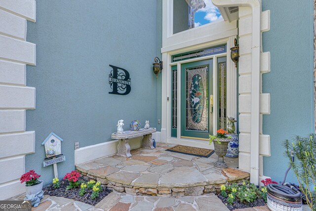 6780 Lawson Cir, Gainesville, GA 30506 - doorway to property with stucco siding